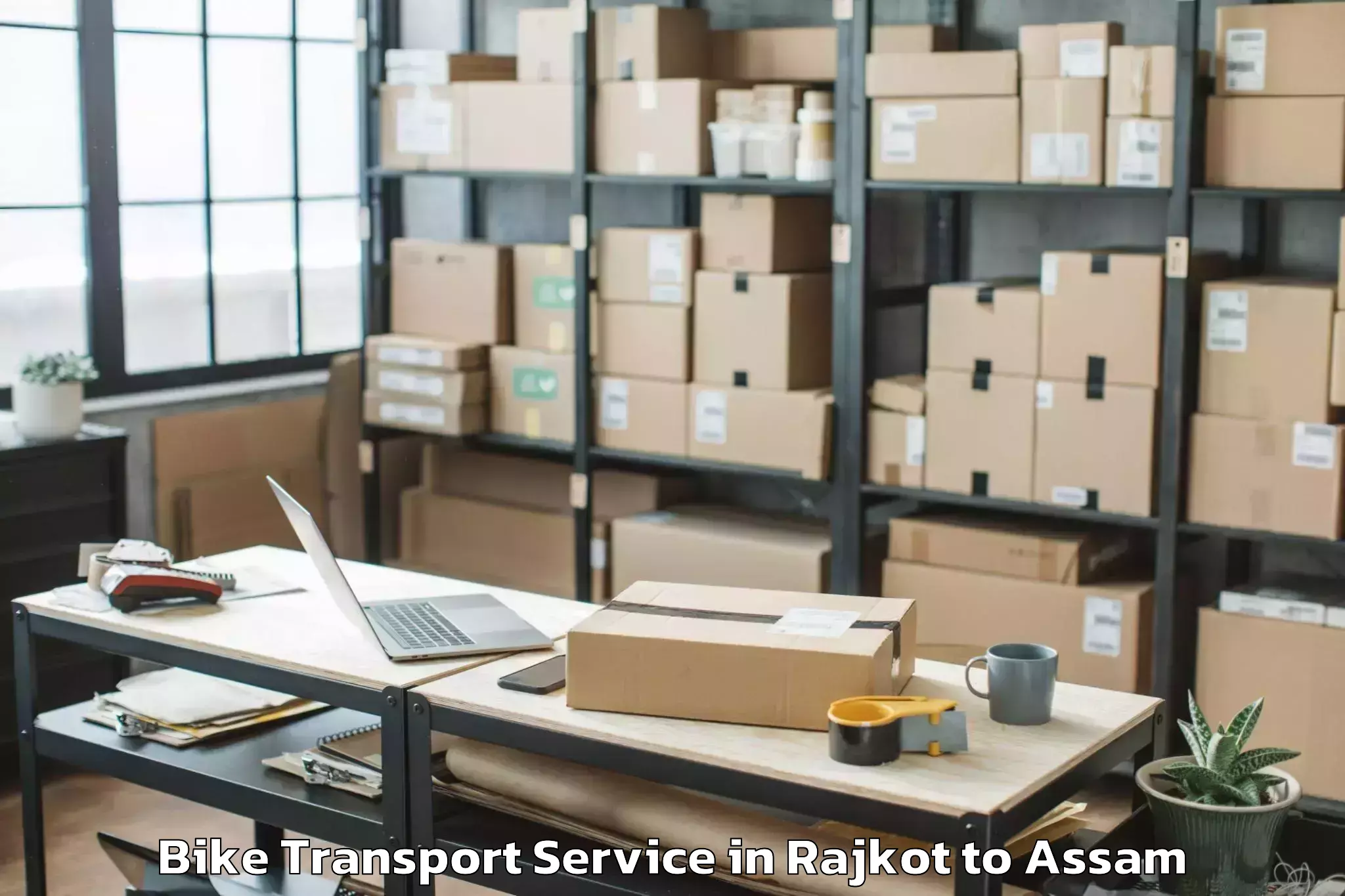 Leading Rajkot to Duliajan Bike Transport Provider